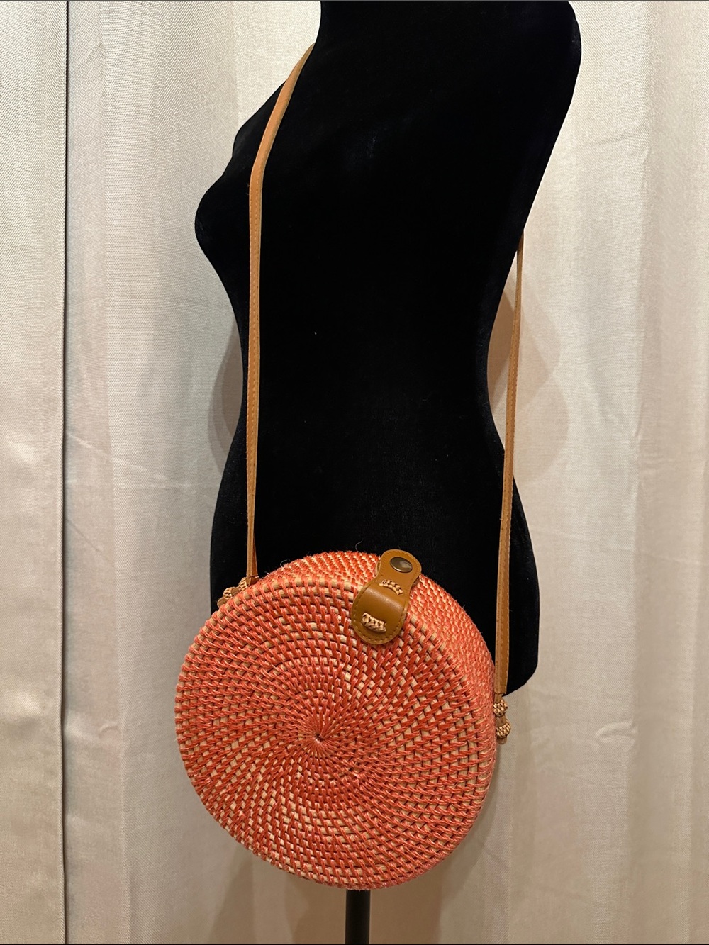 Round Woven Crossbody Bag in Coral with Tan Strap